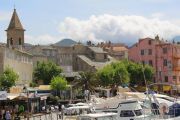 Church And Colourful Houses